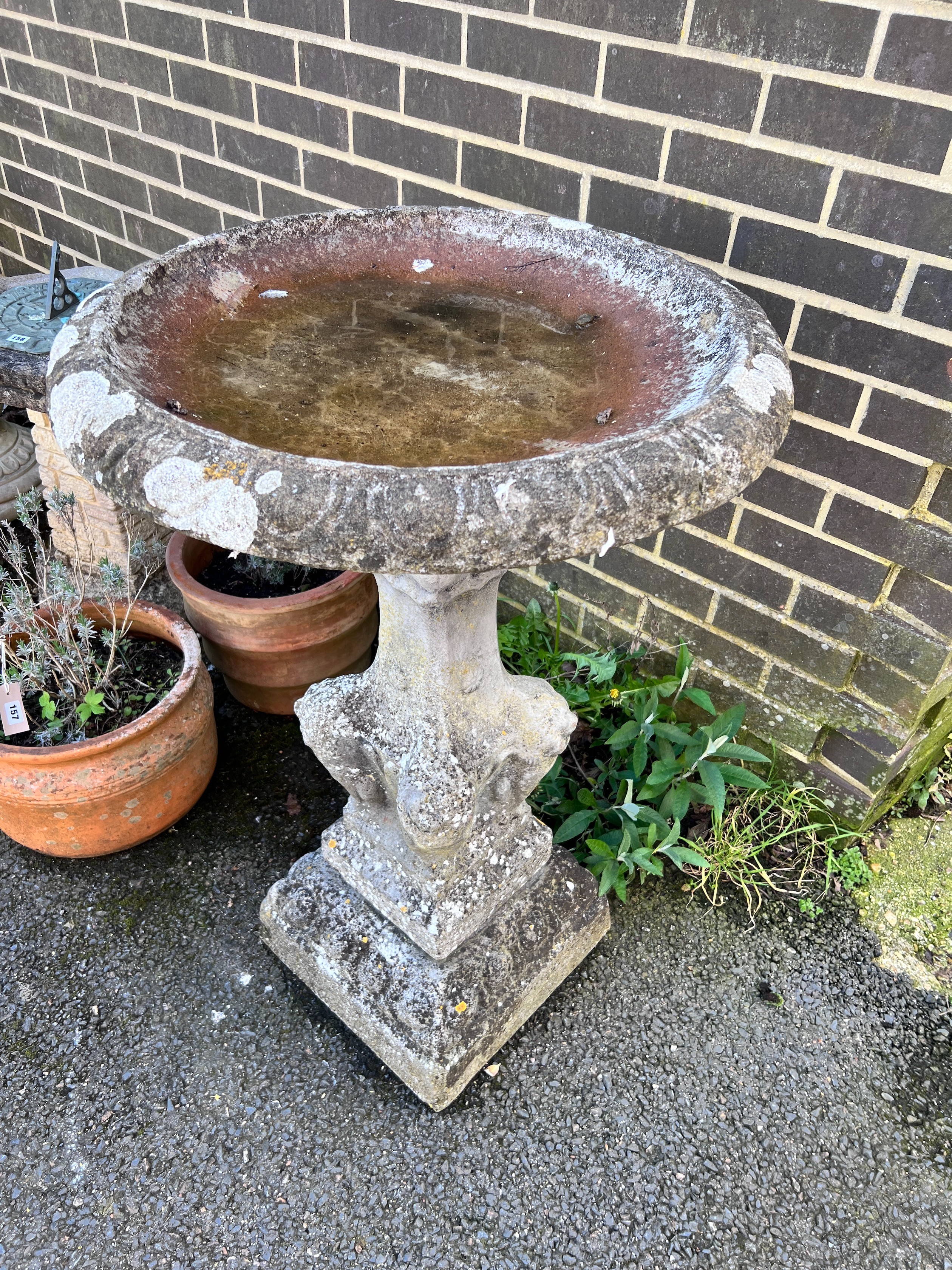 A circular reconstituted stone bird bath, diameter 65cm, height 94cm *Please note the sale commences at 9am.